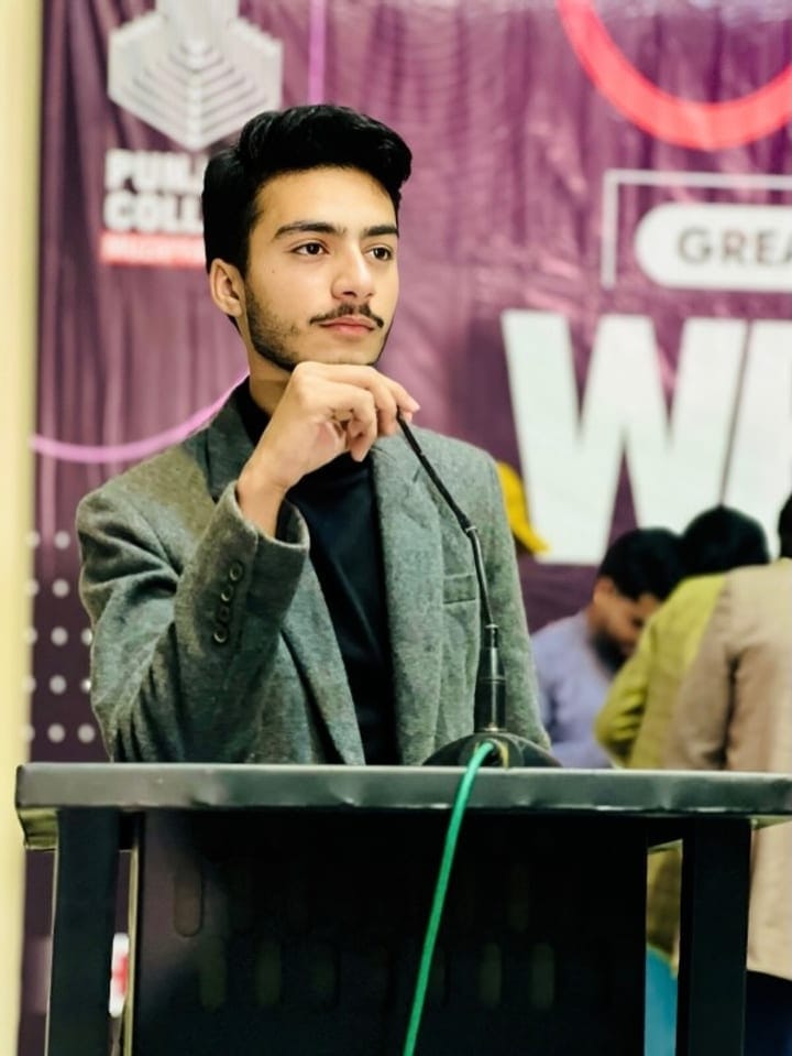 Willay Haider speaking at a business event